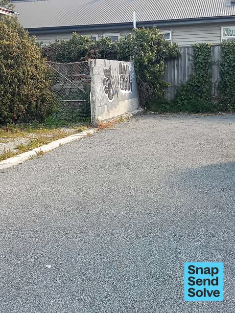 Graffiti on a fence, building or structure — a report photo