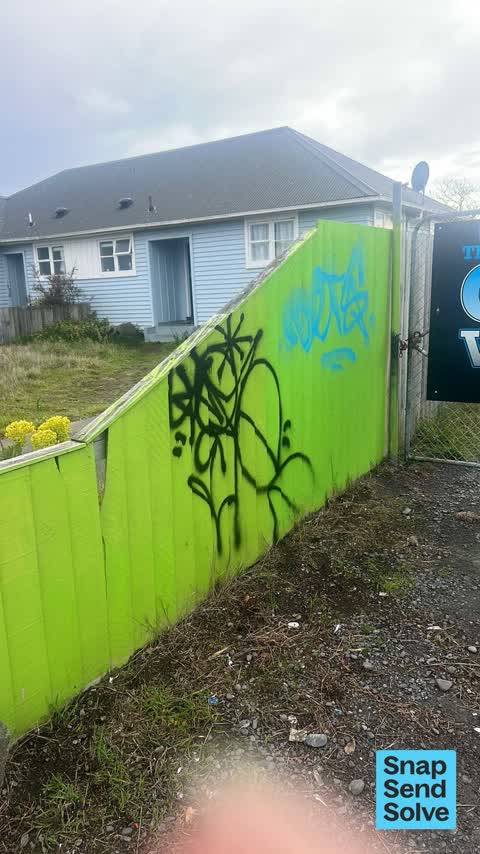 Graffiti on a fence, building or structure, a report photo