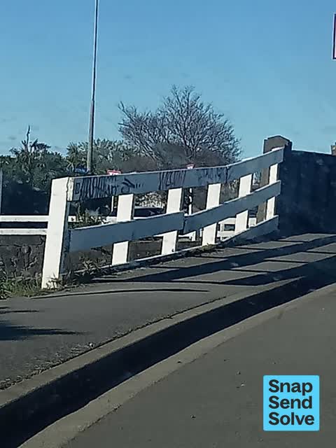 Graffiti on a road, footpath or bridge, a report photo