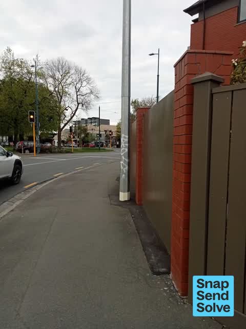 Graffiti on a fence, building or structure — a report photo