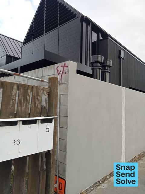 Graffiti on a fence, building or structure — a report photo