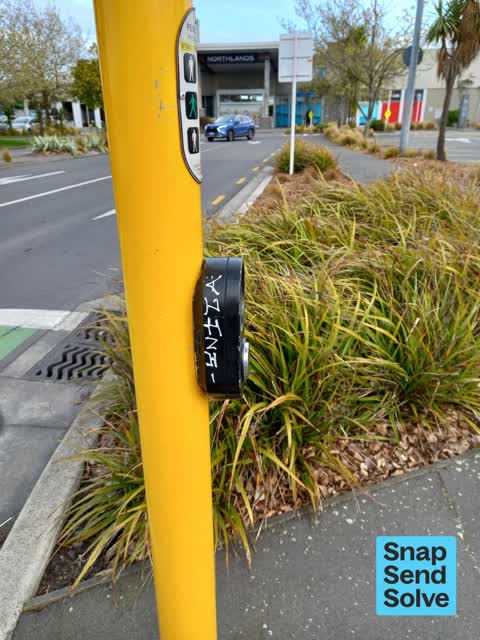 Graffiti on a traffic light pole or cabinet, or wa, a report photo