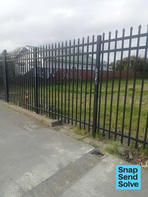 Graffiti on a fence, building or structure, a report photo