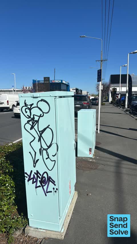 Graffiti on a traffic light pole or cabinet, or wa, a report photo