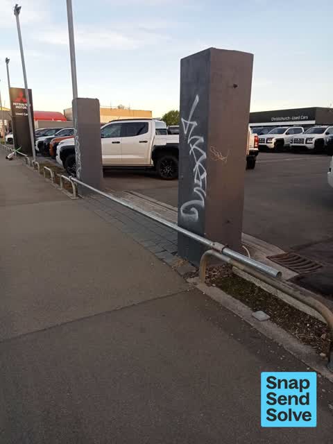 Graffiti on a fence, building or structure, a report photo