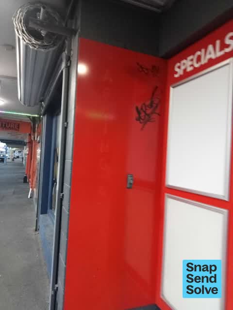 Graffiti on a fence, building or structure — a report photo