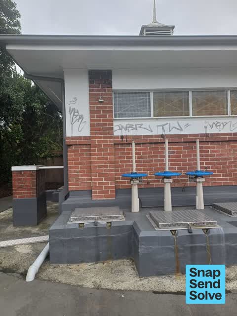 Graffiti on a fence, building or structure — a report photo