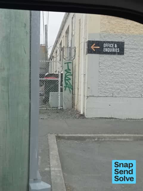Graffiti on a fence, building or structure, a report photo