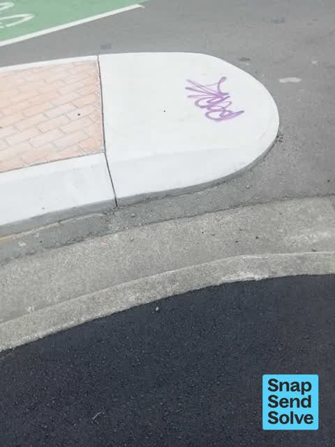 Graffiti on a road, footpath or bridge, a report photo