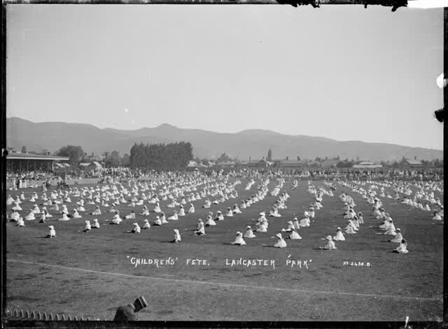 Childrens' fete at Lancaster Park, Christchurch, [ca 1910], 1910