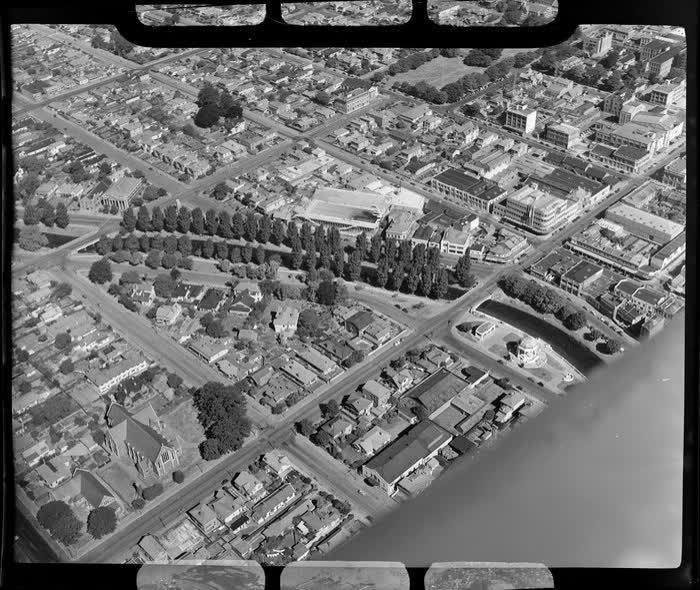 A view of Manchester Street, going towards Christchurch City, including Avon River in the foreground, 1950