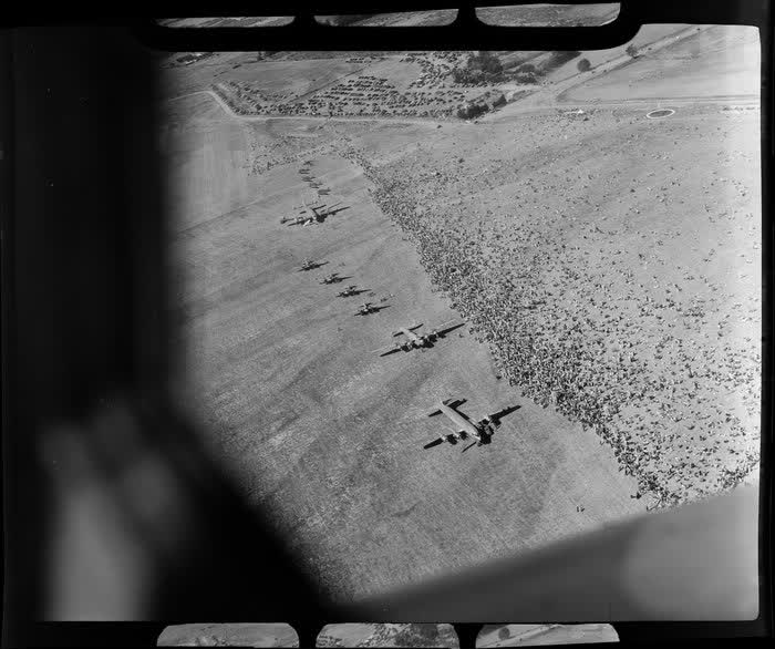 Aerial view of aircraft and spectators at the dedication of Harewood Airport, Christchurch, 1950