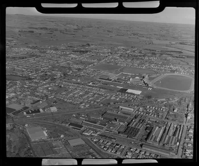 Addington Workshops and the saleyards, Christchurch, Canterbury Region, shows factories, suburban housing, and Racecourse, 1951