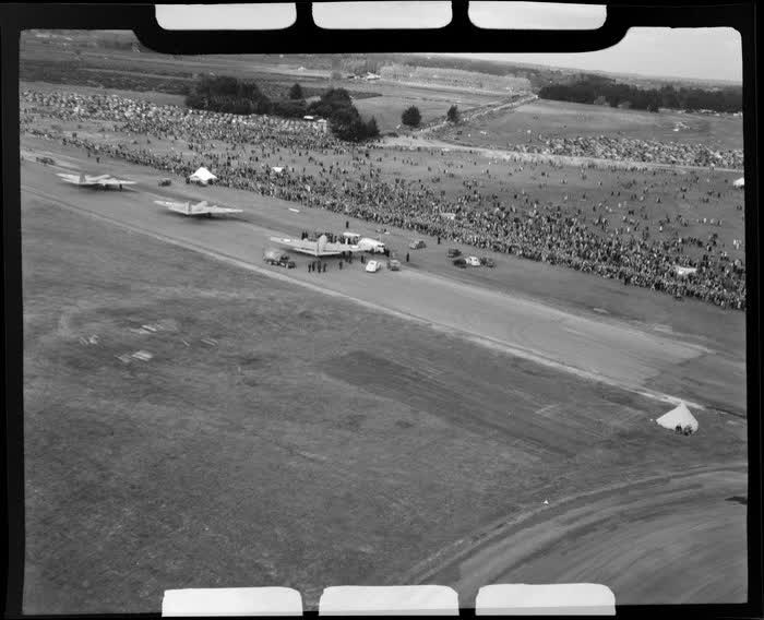 Harewood Airport, Christchurch, 1953 London-Christchurch Air Race, showing three canberra aircrafts and spectators, 1953