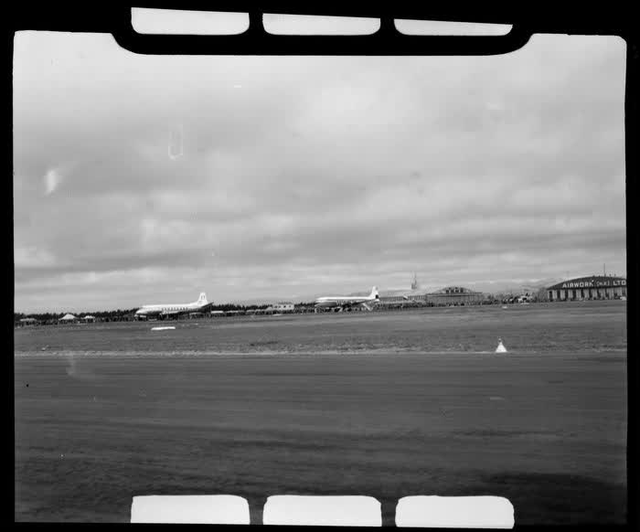 Harewood Airport, Christchurch, 1953 London-Christchurch Air Race, showing a BEA Viscount aircraft (front) and KLM DC6 aircraft (rear), 1953