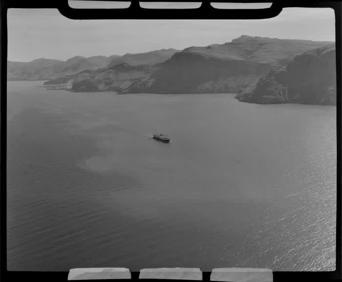 Boat sailing toward Lyttelton Harbour, Christchurch, 1955