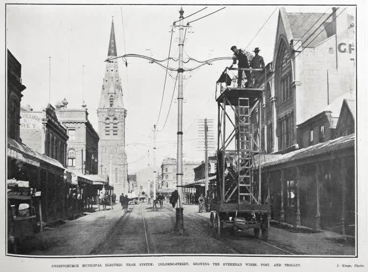 CHRISTCHURCH MUNICIPAL ELECTRIC TRAM SYSTEM: COLOMBO-STREET, SHOWING THE OVERHEAD WIRES, POST, AND TROLLEY, 1905