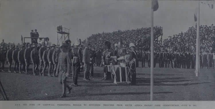 H.R.H the Duke of Cornwall presenting medals to returned troopers from South Africa, Hagley Park, Christchurch, June 24, 1901, 1901