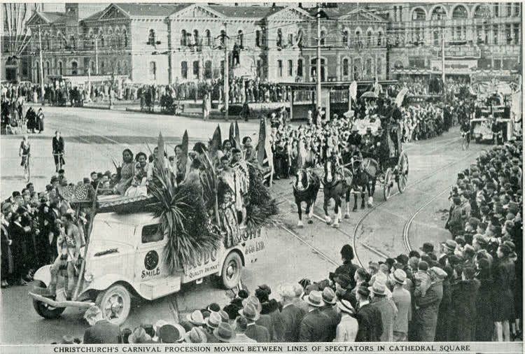 Christchurch's carnival procession moving between lines of spectators in Cathedral Square, 1937
