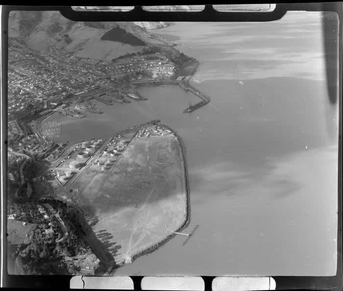 Lyttelton with industrial area and harbour, Christchurch City, Canterbury Region, 1947