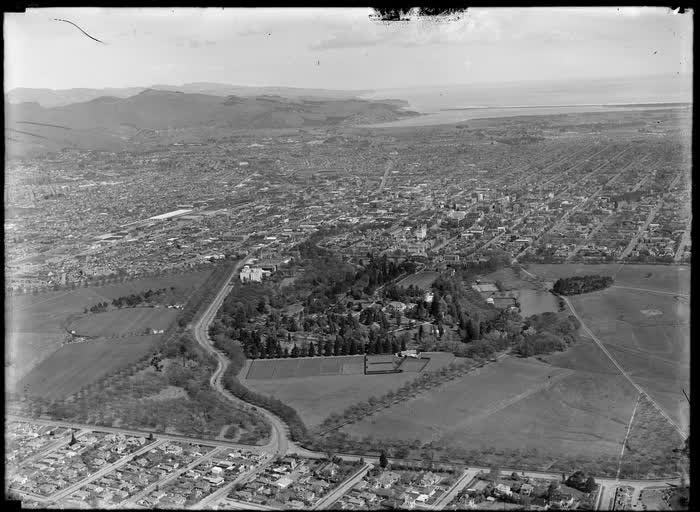 Christchurch City and Hagley Park with Riccarton Avenue in foreground, Canterbury, 1947