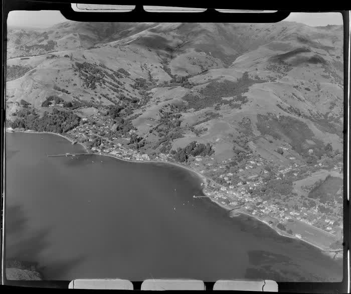 View of the Banks Peninsula coastal village and harbour of Akaroa, Christchurch District, Canterbury Region, 1947