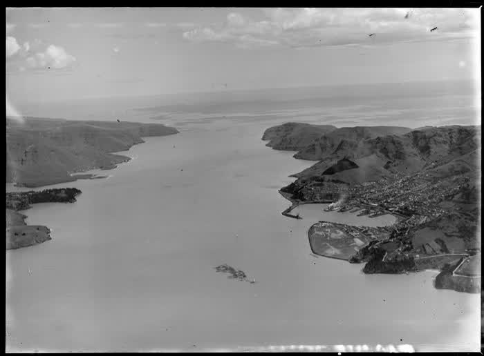 Lyttelton Harbour and township with wharf area, looking to the Pacific Ocean, Christchurch, Canterbury, 1946