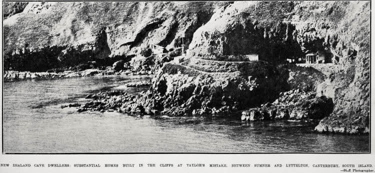 New Zealand cave dwellers: substantial homes built in the cliffs at Taylor's Mistake, between Sumner and Lyttelton, Canterbury, South Island, 1924