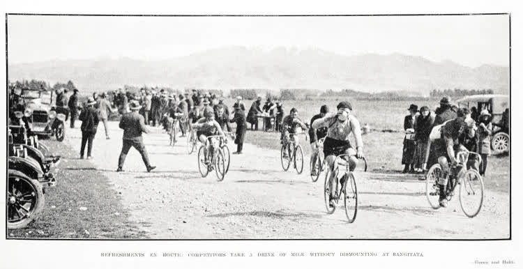 Refreshments en route: competitors take a drink of milk without dismounting at Rangitata, 1925