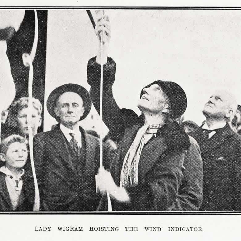 Lady Wigram hoisting the wind indicator, 1929