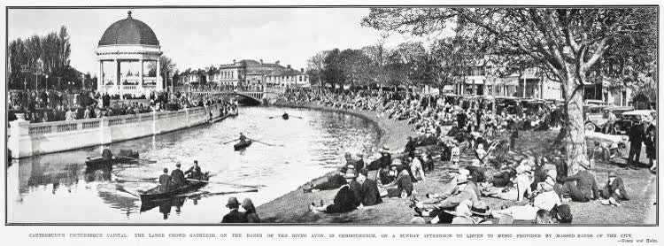 The large crowd gathered on the banks of the River Avon, in Christchurch, on a Sunday afternoon to listen to music provided by massed bands of the city, 1930