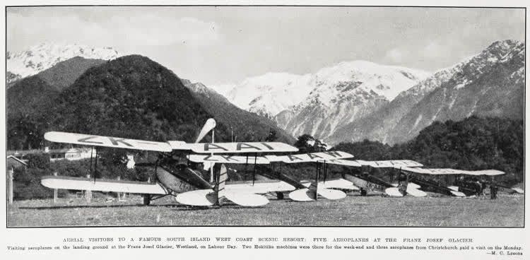 Aerial visitors to a famous South Island West Coast scenic resort: five aeroplanes at the Franz Josef Glacier, 1933