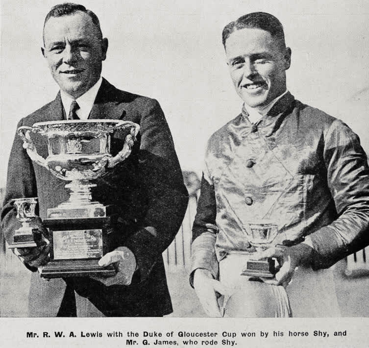 Mr. R. W. A. Lewis With the Duke of Gloucester Cup won by his horse Shy, and Mr. G. James, who rode Shy, 1936