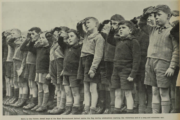 Young boys salute the flag, 1945