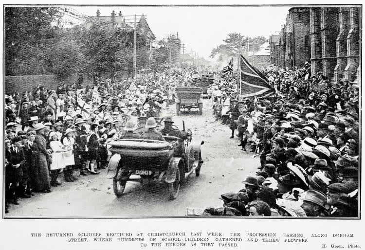 The returned soldiers received at Christchurch last week: the procession passing along Durham Street. Where hundreds of school-children gathered and threw flowers to the heroes as they passed, 1915