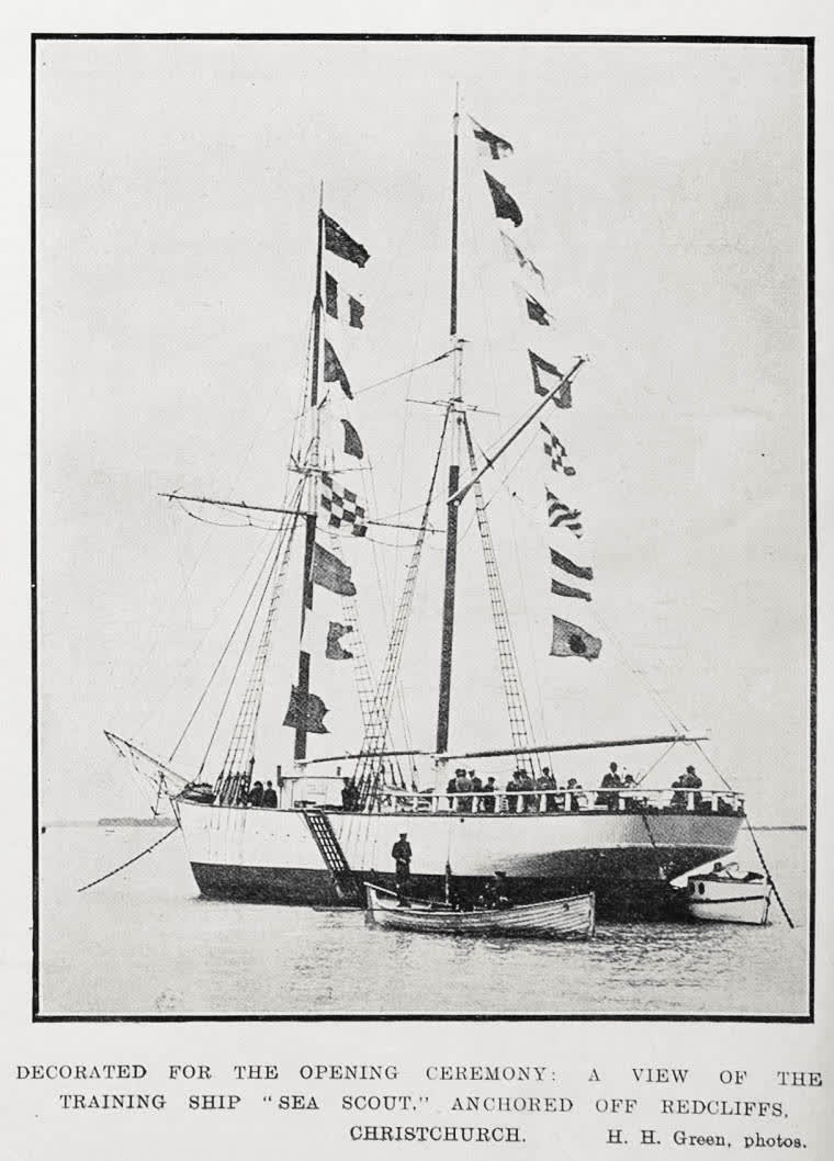 Decorated for the opening ceremony: a view of the training ship Sea Scout, anchored off Redcliffs, Christchurch, 1922