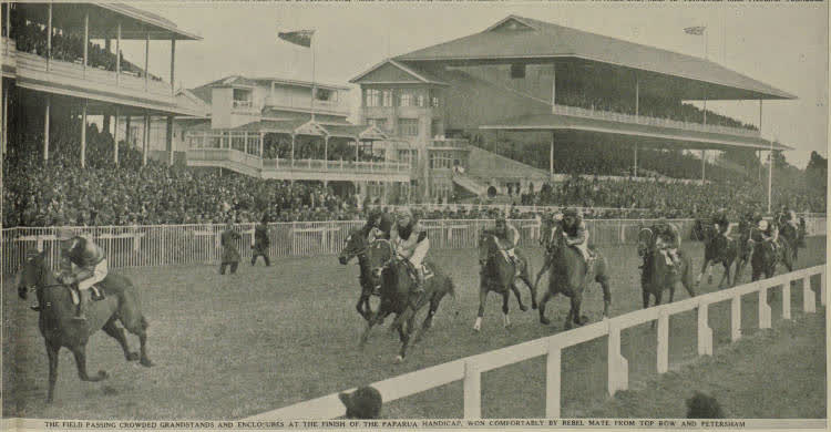 The field passing crowded grandstands and enclosures at the finish of the Paparua Handicap, won comfortably by Rebel Mate from Top Row and Petersham, 1938