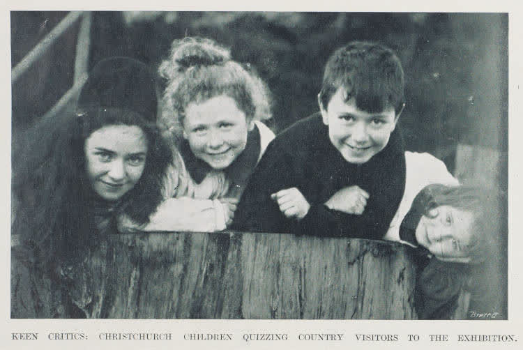 Keen critics: Christchurch children quizzing country visitors to the exhibition, 1906