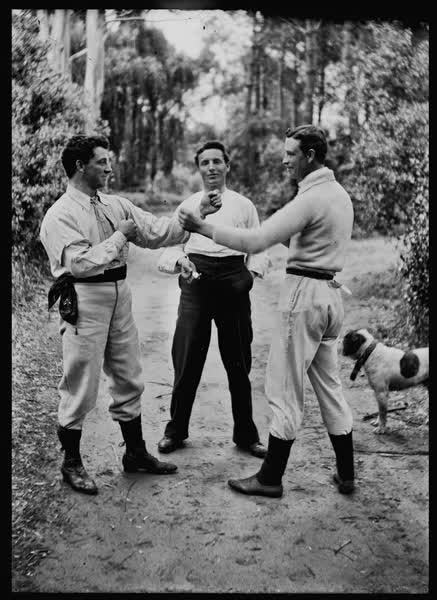 Two men dressed as boxers in Hagley Park, 1900