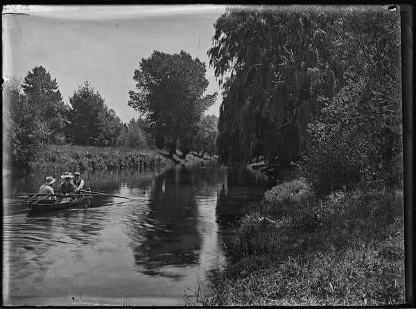 The Avon River with two men and a woman in rowboats, 1900