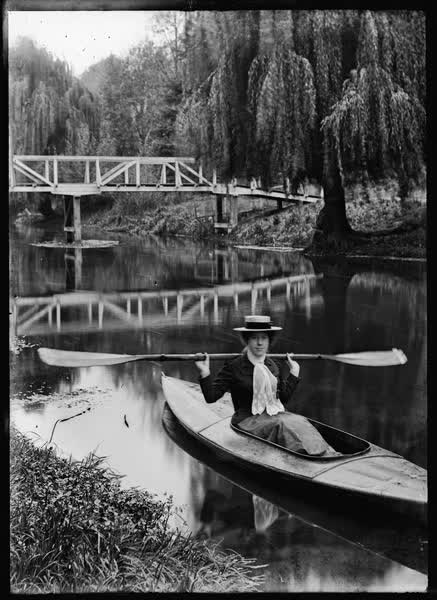 Woman in a canoe on the Avon River, 1900