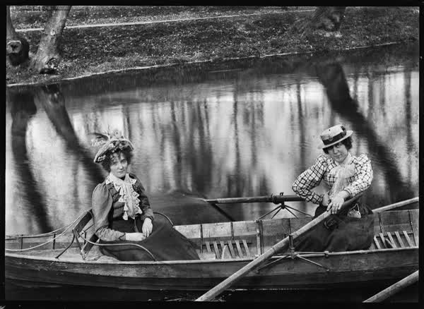 Two women in a rowboat on the Avon River, 1900