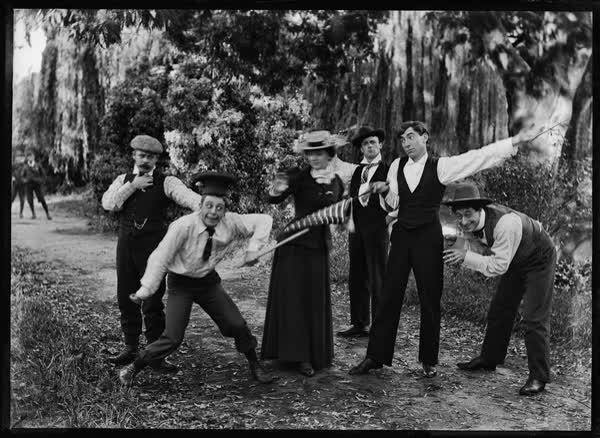 Group of five men and one woman in Hagley Park, 1900