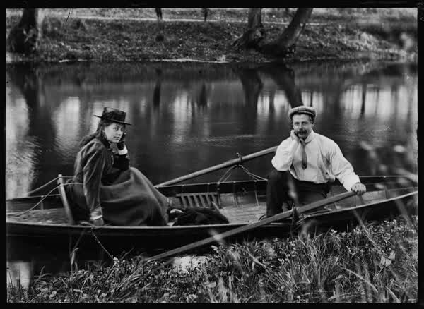 Man and woman in a rowboat on the Avon River, 1900