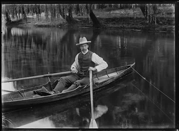 Man in a rowboat on the Avon River, 1900