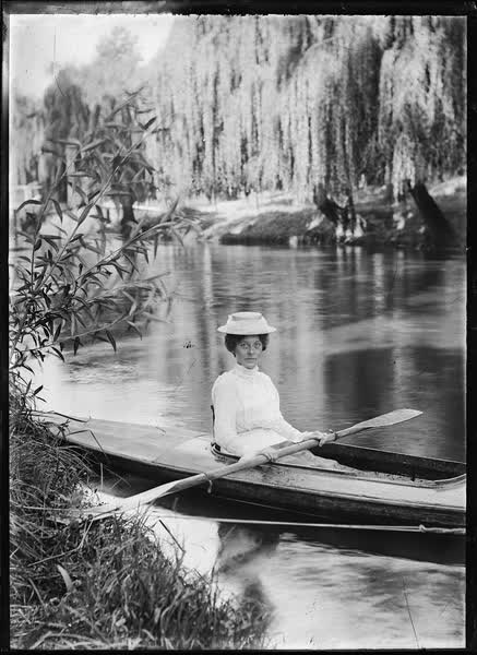 Woman in a canoe on the Avon River, 1900