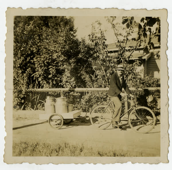 Gordon Marker delivering milk during petrol restrictions, 1910