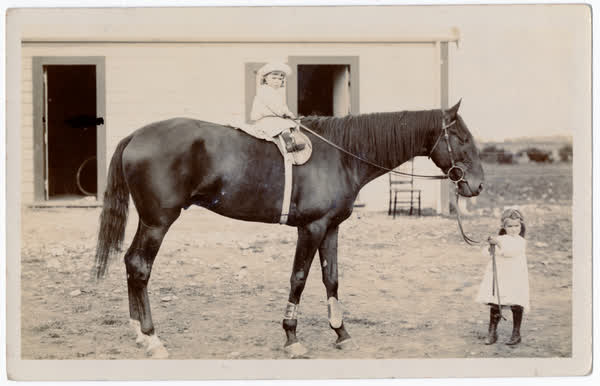 Dorothy & Maurice Bridges with horse, 1909, 1900