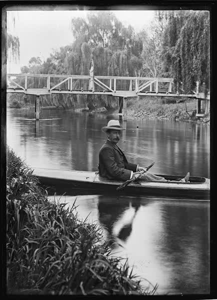 Man in a canoe on the Avon River, 1900