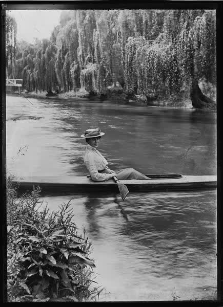 Woman in a canoe on the Avon River, 1900